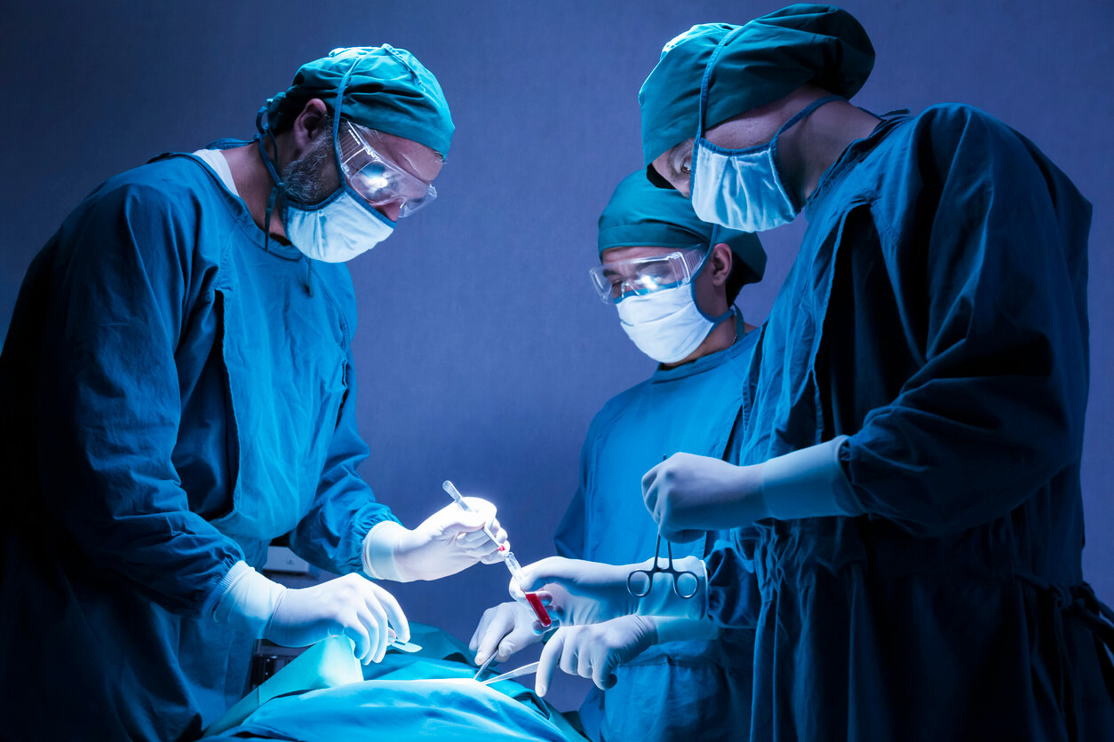 orthopedic surgeons team operating surgery